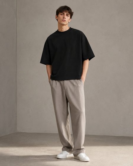 Heavy Tee in Black worn with wide trousers